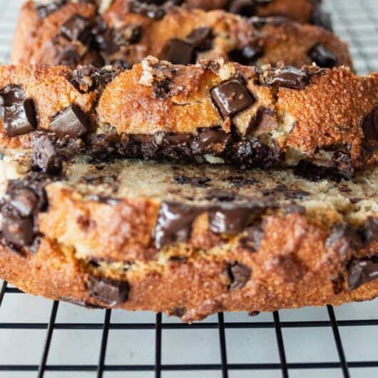 closeup of slices of chocolate chip banana bread on the cooling tray