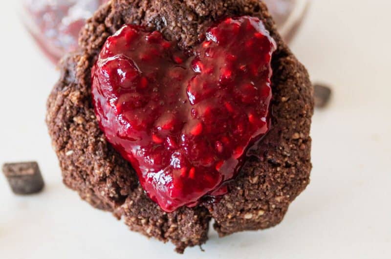 Chocolate Raspberry thumbprint cookie and pot of raspberry jam
