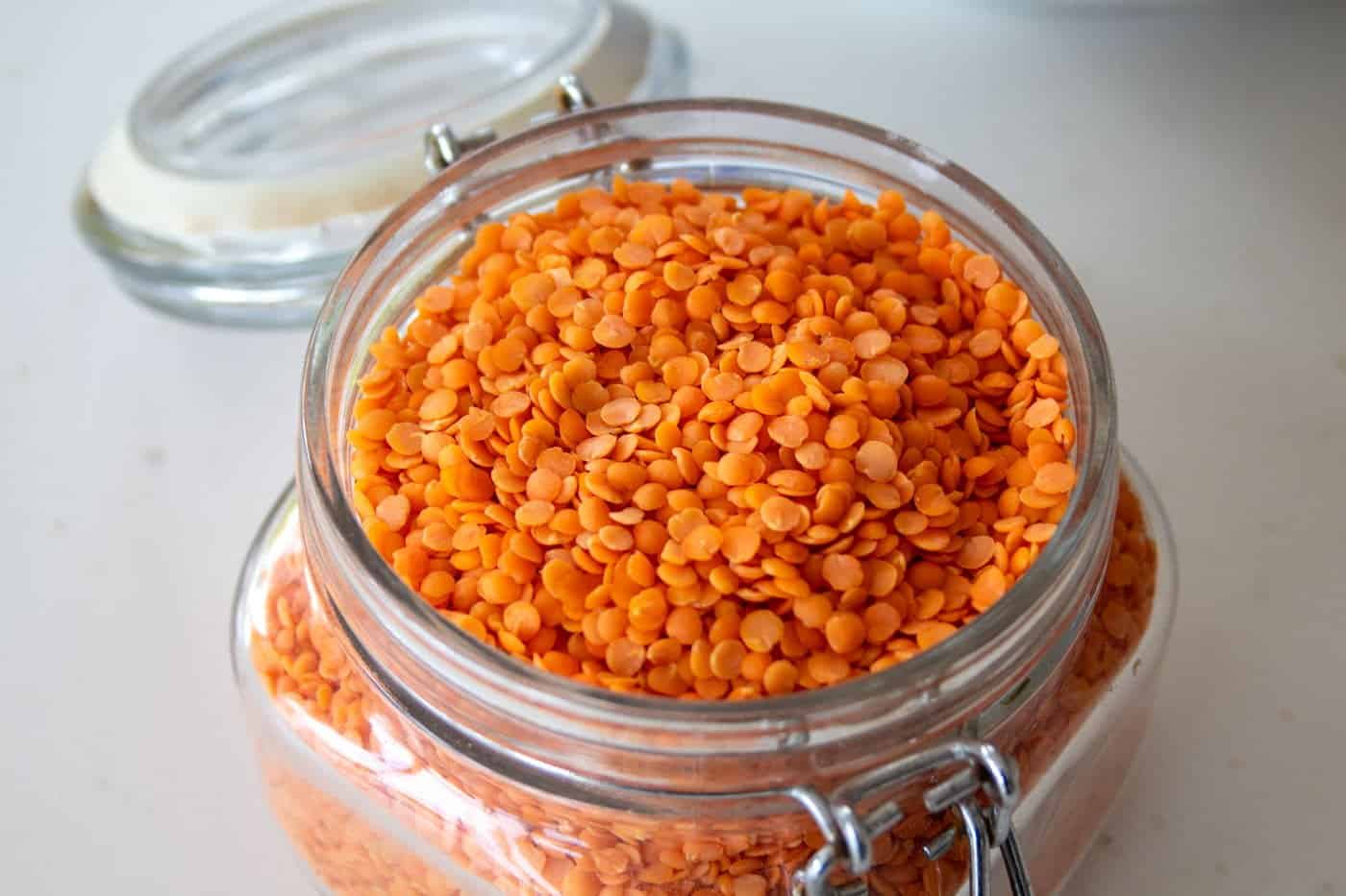 a jar of red split lentils