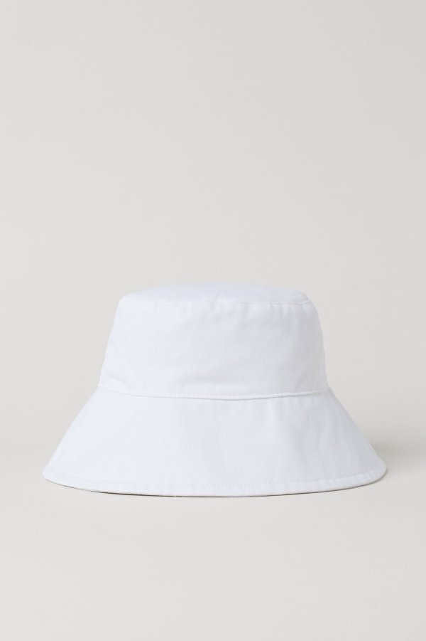 Best Prada Bucket Hat Dupes 2021 9 Yellow White Pink And Black Bucket Hats That Look Exactly Like Prada From Kangol H M Nike And More Wear Next