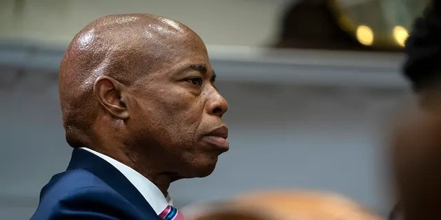 Brooklyn Borough President and New York City mayoral candidate Eric Adams listens as President Joe Biden speaks during a meeting on reducing gun violence, in the Roosevelt Room of the White House, Monday, July 12, 2021, in Washington. (AP Photo/Evan Vucci)