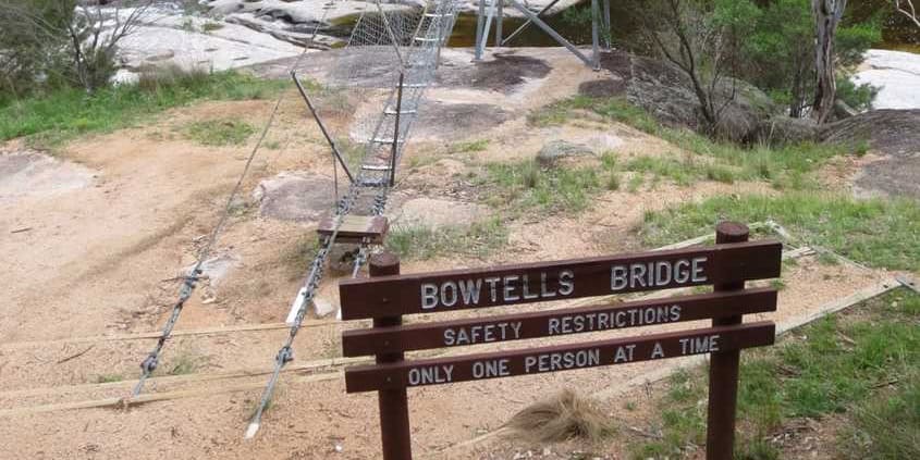 The sign as you reach Bowtells Swing Bridge on the Six Foot Track