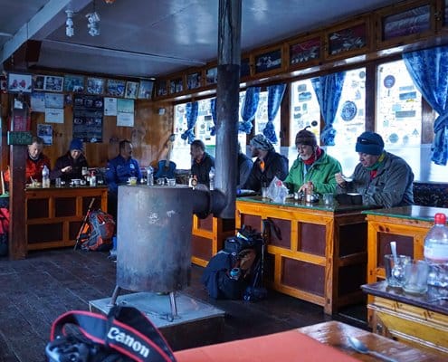 Enjoy a meal after a long day of trekking in the Himalayas