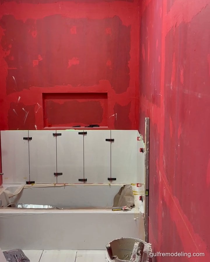 Bathroom walls sealed with waterproofing before tile
