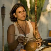 Claudia Lyra with berimbau