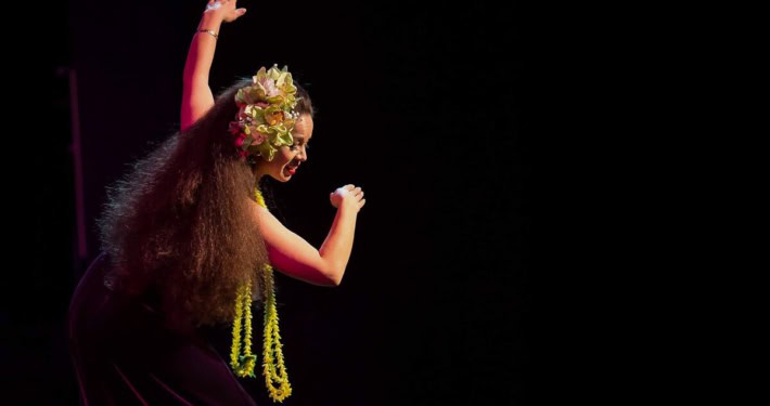 Image of Edie Stanley performing Hawaiian dance on stage