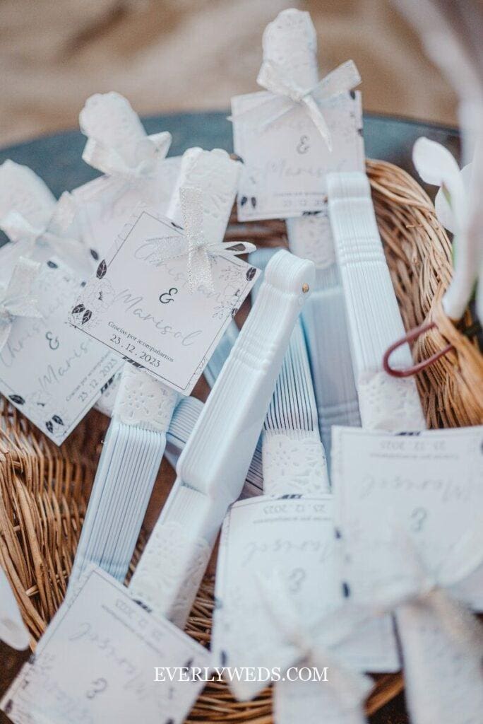 Wedding favors with cards in a basket