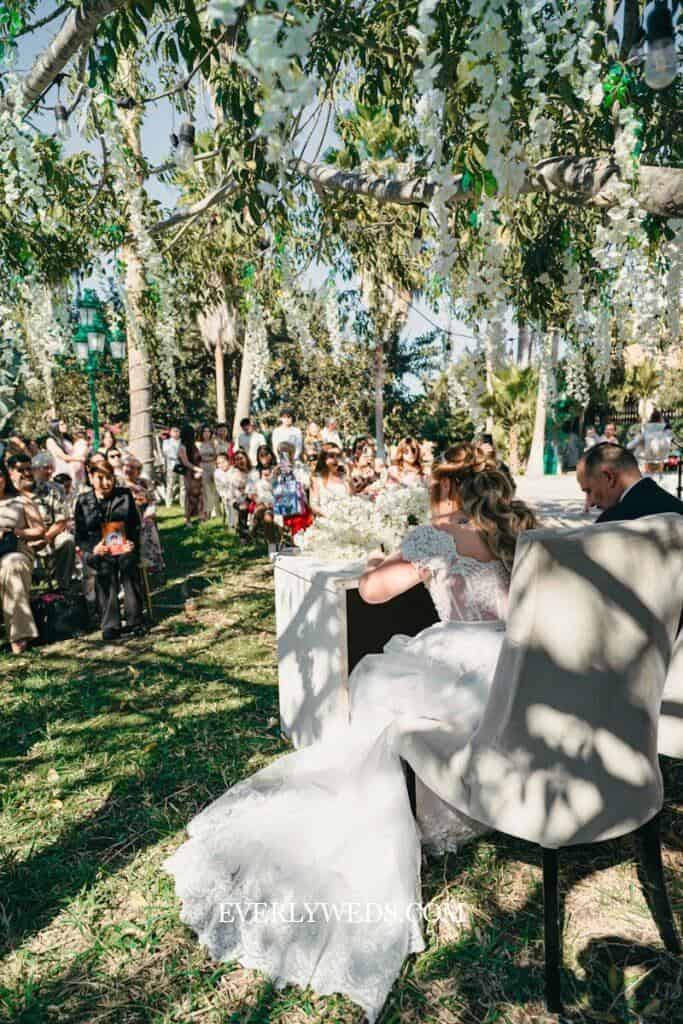 Bride and groom at outdoor wedding ceremony