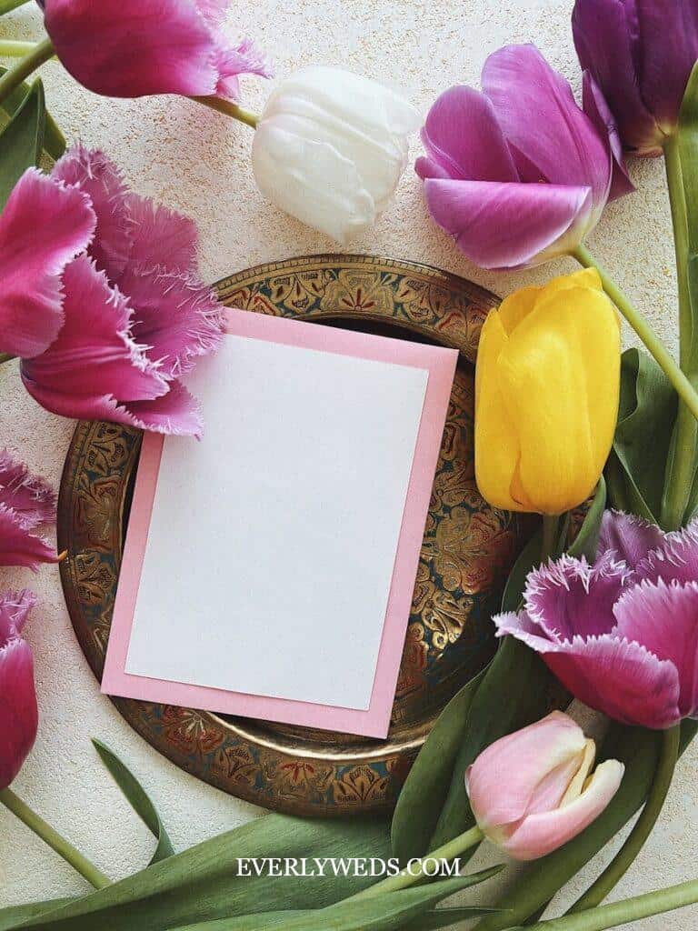 Beautiful floral save the date card with tulips on decorative plate - unique wedding stationery ideas