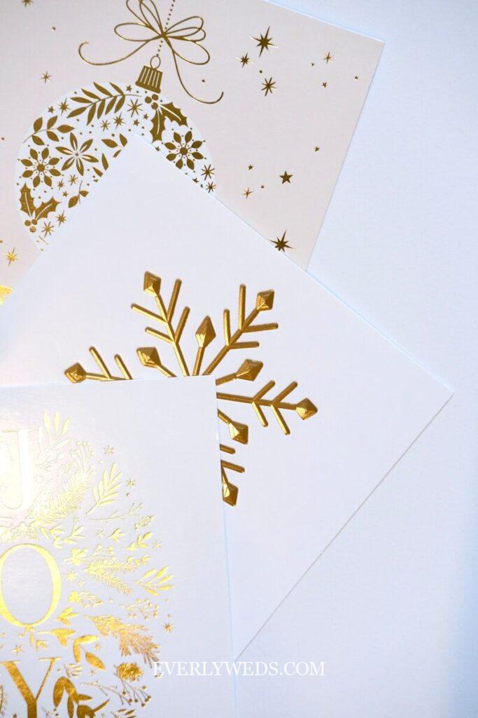 Gold foil Christmas ornament and snowflake save the date cards for winter wedding ideas