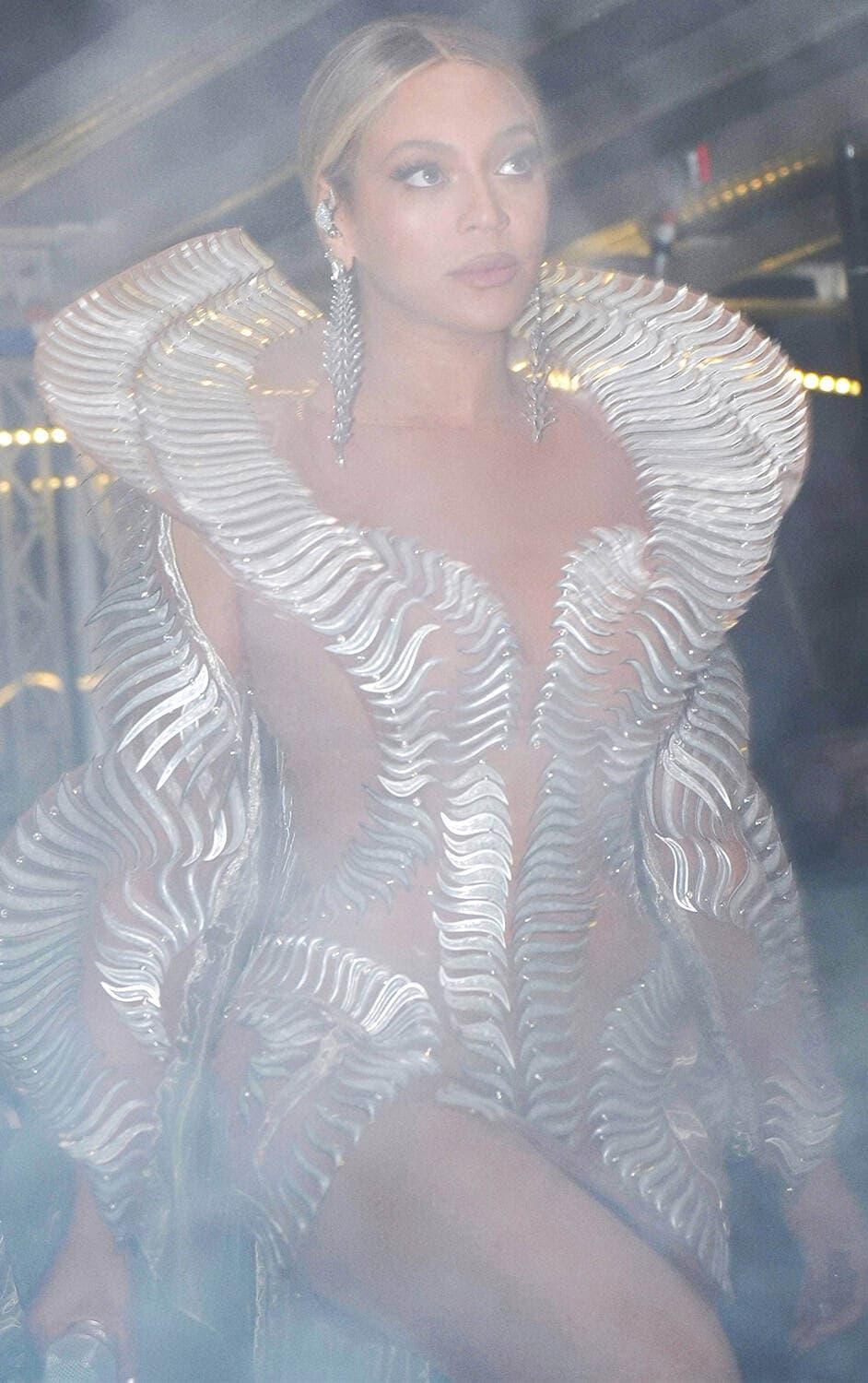 silver dress beyonce See Every Look From Beyonc's 2023 Renaissance World Tour This silver outfit is everything.