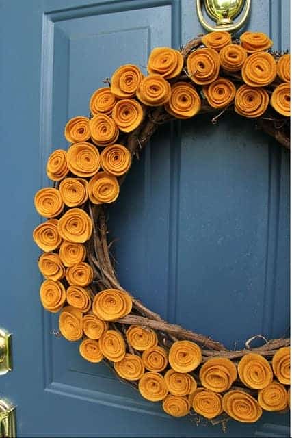 Rustic DIY wreath made with twigs and autumn foliage