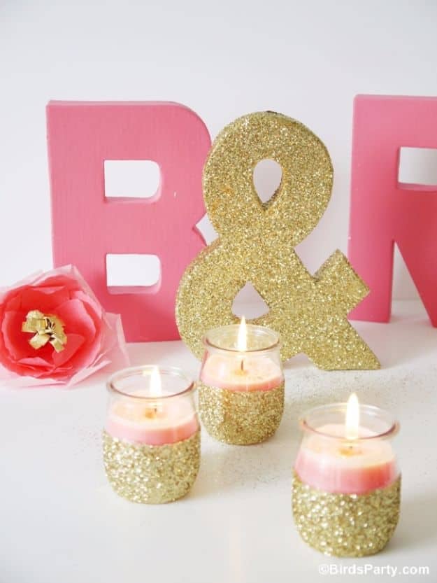 3. DIY Pink Candles And Glitter Candle Holders