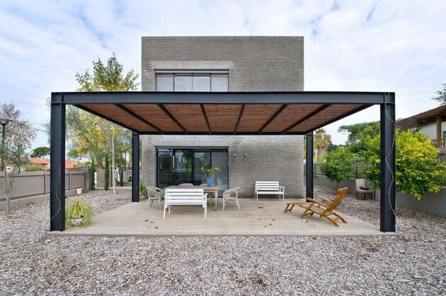 Installing Low-Maintenance Elements Like Modern Pergolas Can Create a More Welcoming Backyard