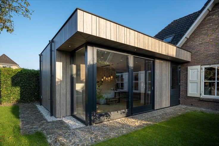 Experience Luxury Living in this Modern Apartment with a Sleek Extension