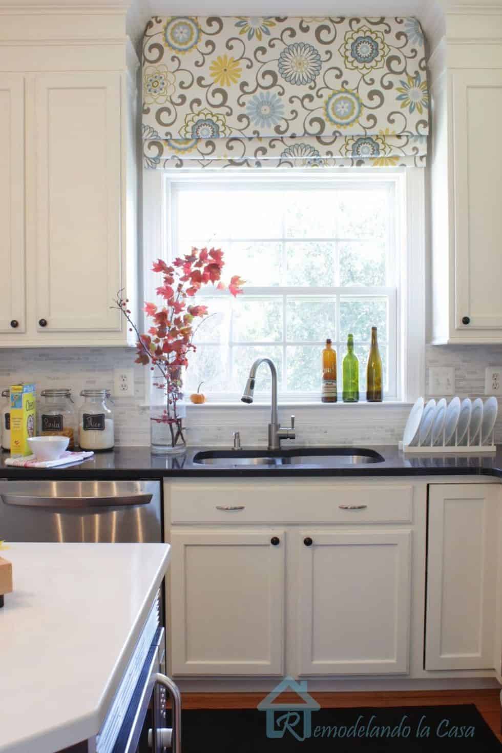 1. A little fabric can give old Roman shades a brand new look