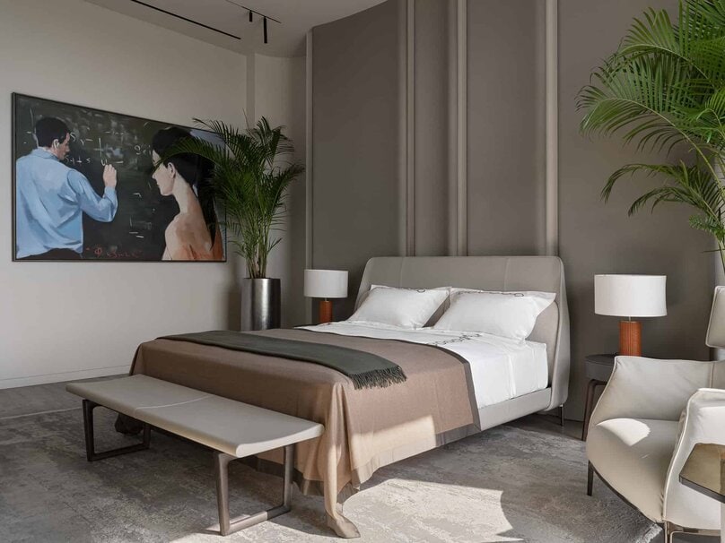 Minimalist bedroom with large artwork and potted greenery creating a calm atmosphere.