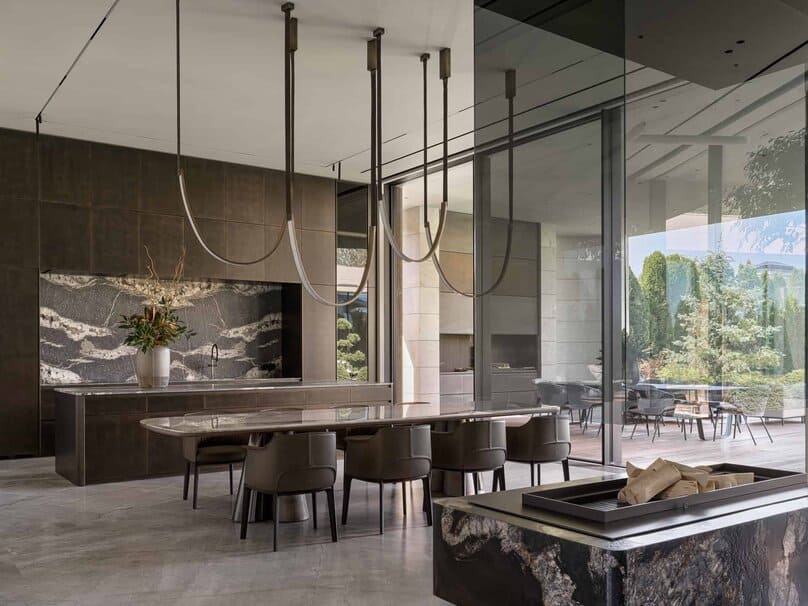 Modern dining area with seamless access to garden terrace.