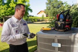 A trusted, background-checked Bell Brothers tech services an outdoor AC unit, backed by upfront pricing and a No Surprise Guarantee.