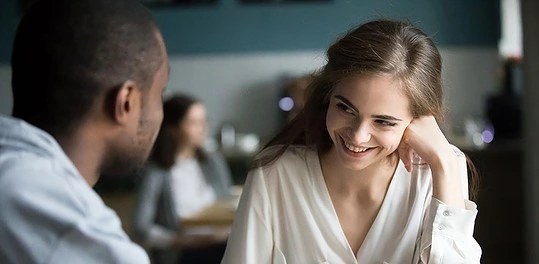 He knows some questions to ask your crush to make her smile