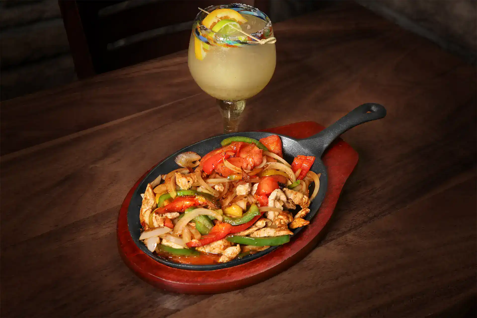 Fresh Chicken and Vegetable Stir-Fry on a sizzling skillet.