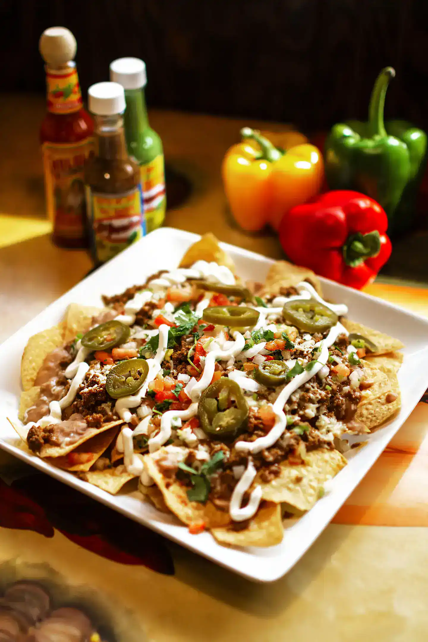 Delicious loaded nachos with jalapeños, cheese, and toppings at Casa Tequila Mexican Grill & Cantina