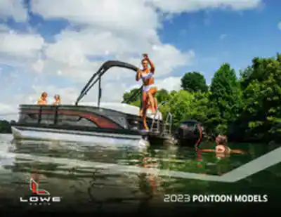 Luxury pontoon boat on the water with family, perfect for recreation and outdoor fun.