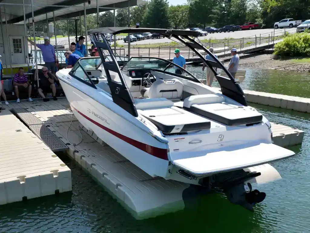 High-quality recreational boat displayed on water for sale.