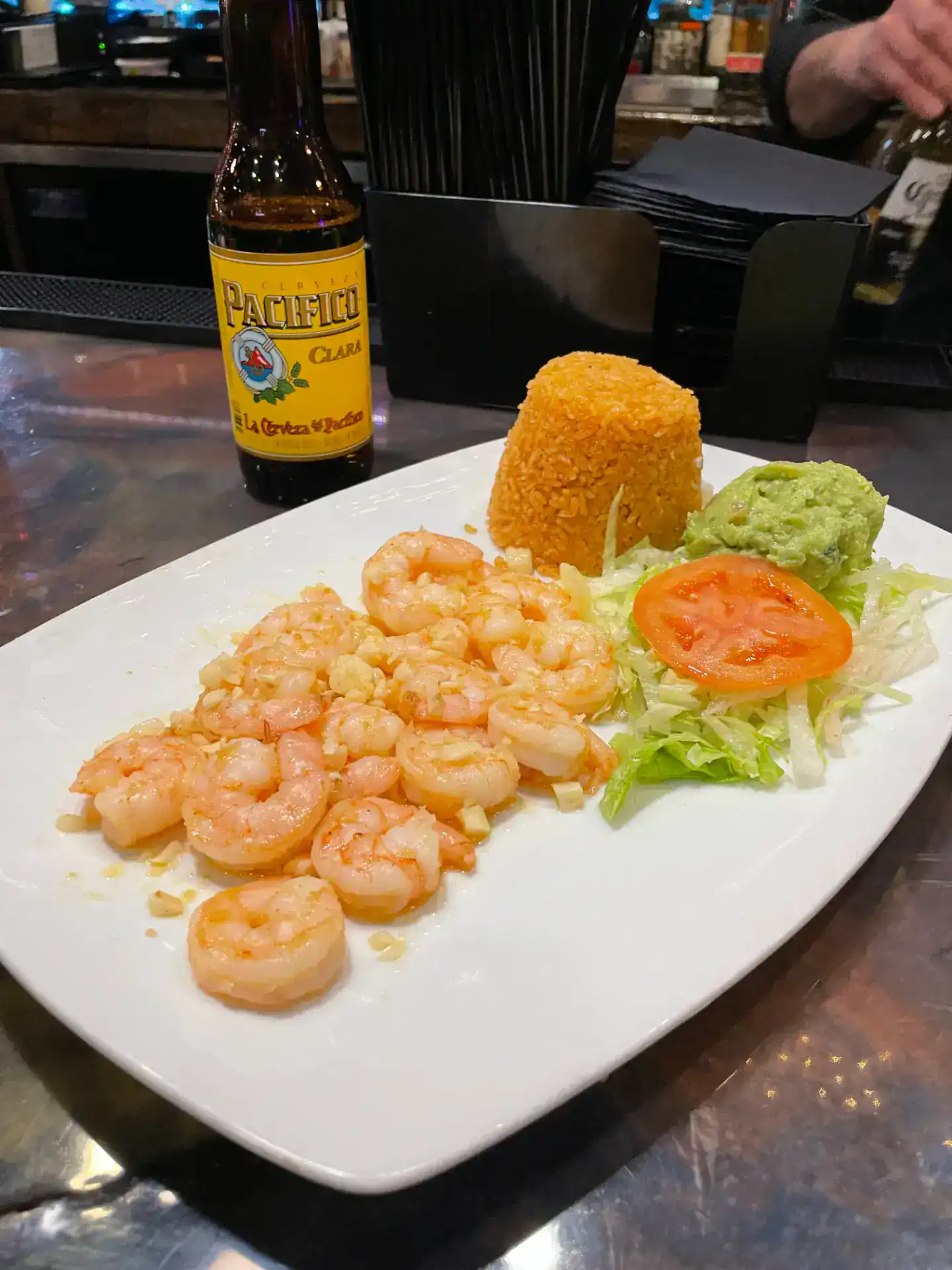 Shrimp dish with Mexican corn cake and guacamole at Casa Tequila Mexican Grill & Cantina, Chicago.