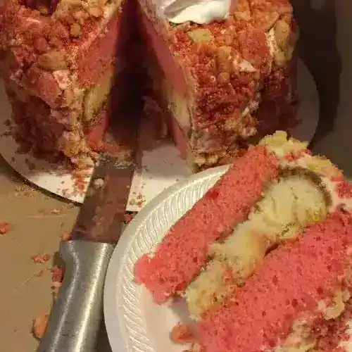 Delicious strawberry shortcake with layers of sponge cake, fresh strawberries, and whipped cream, perfect for special occasions.
