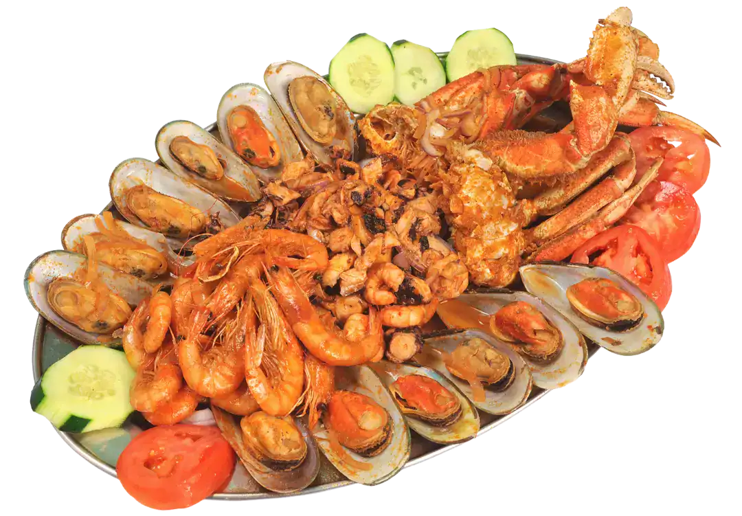 Seafood platter with shrimp, crab, mussels, and vegetables for seafood lovers.