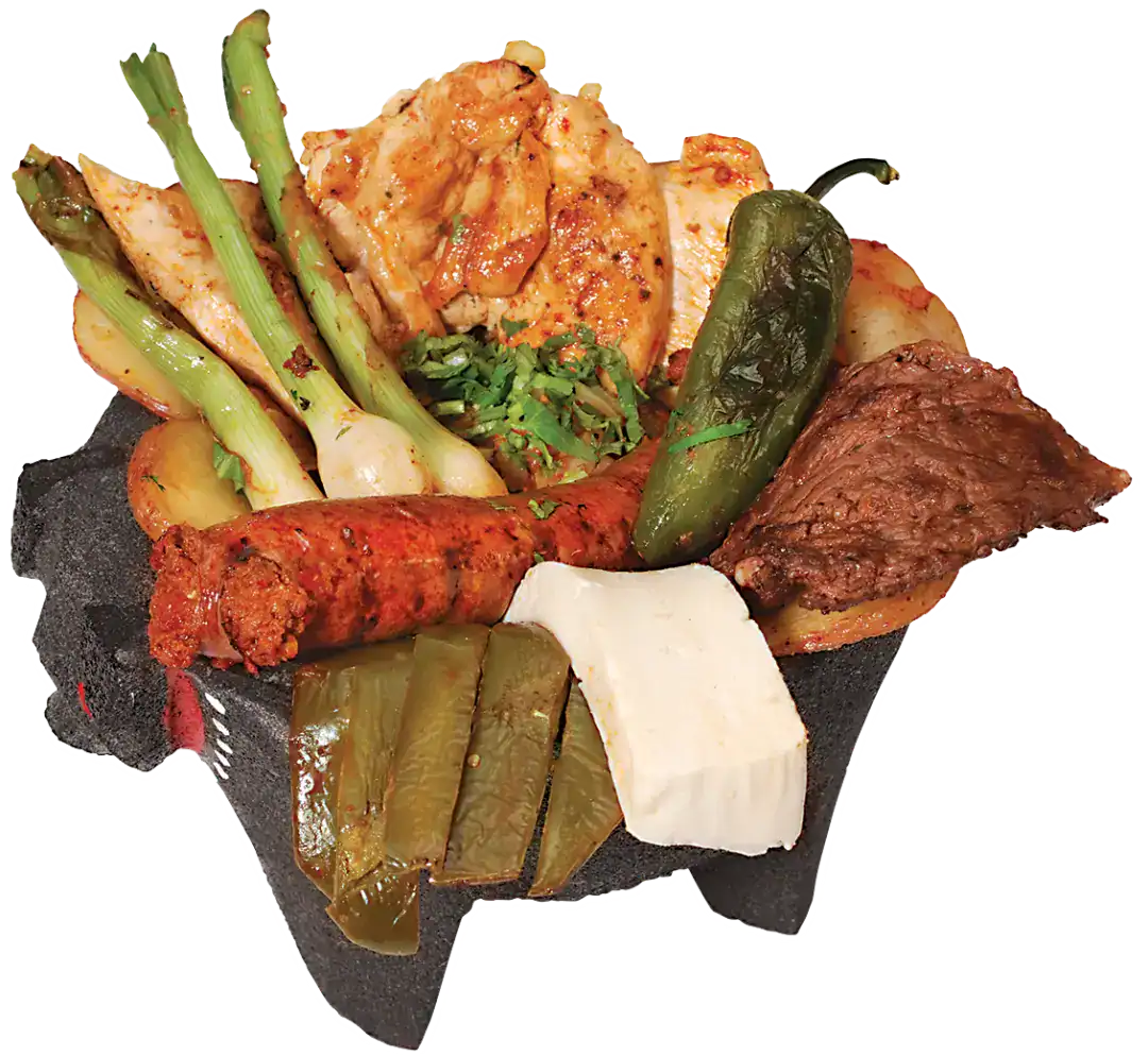 Traditional San Blas platter with meats, vegetables, and peppers.