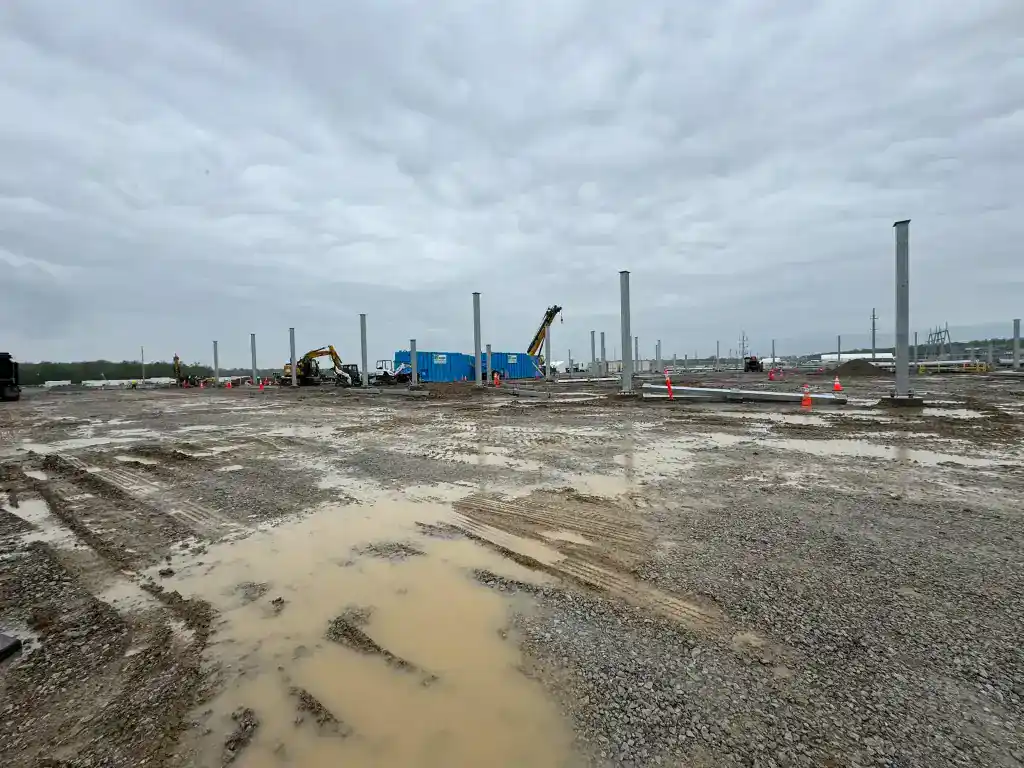 Construction site of a new substation in Northeast Indiana under cloudy skies.