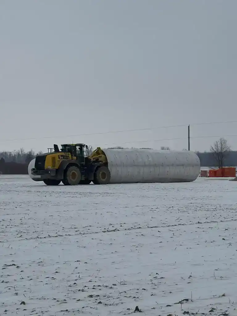 Construction of transmission line in snowy landscape in Northwest Ohio.