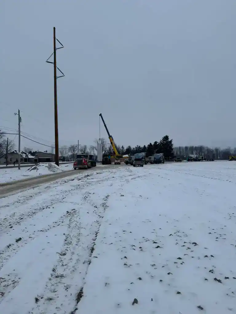 Utility workers repairing transmission lines in snowy Northwest Ohio.