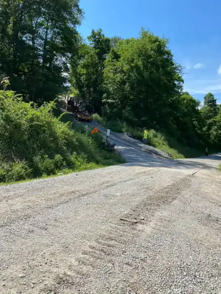 Transmission line repair on a steep hillside in Southeast Ohio.