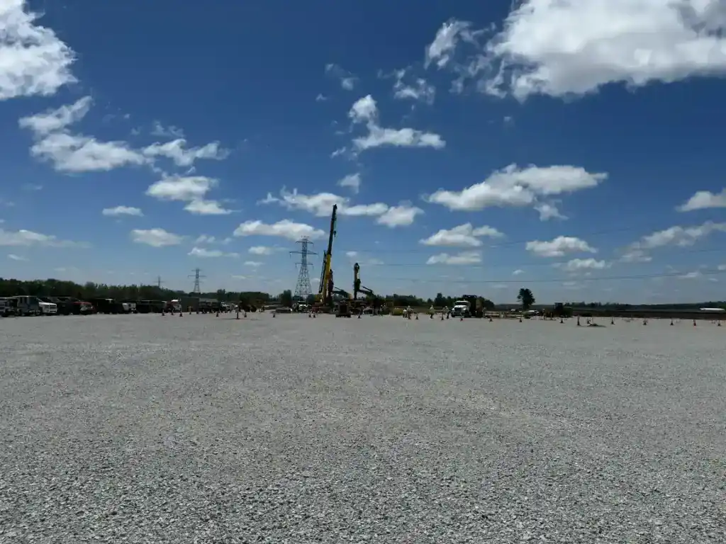 Construction site of a power substation in Northern Indiana under a blue sky.