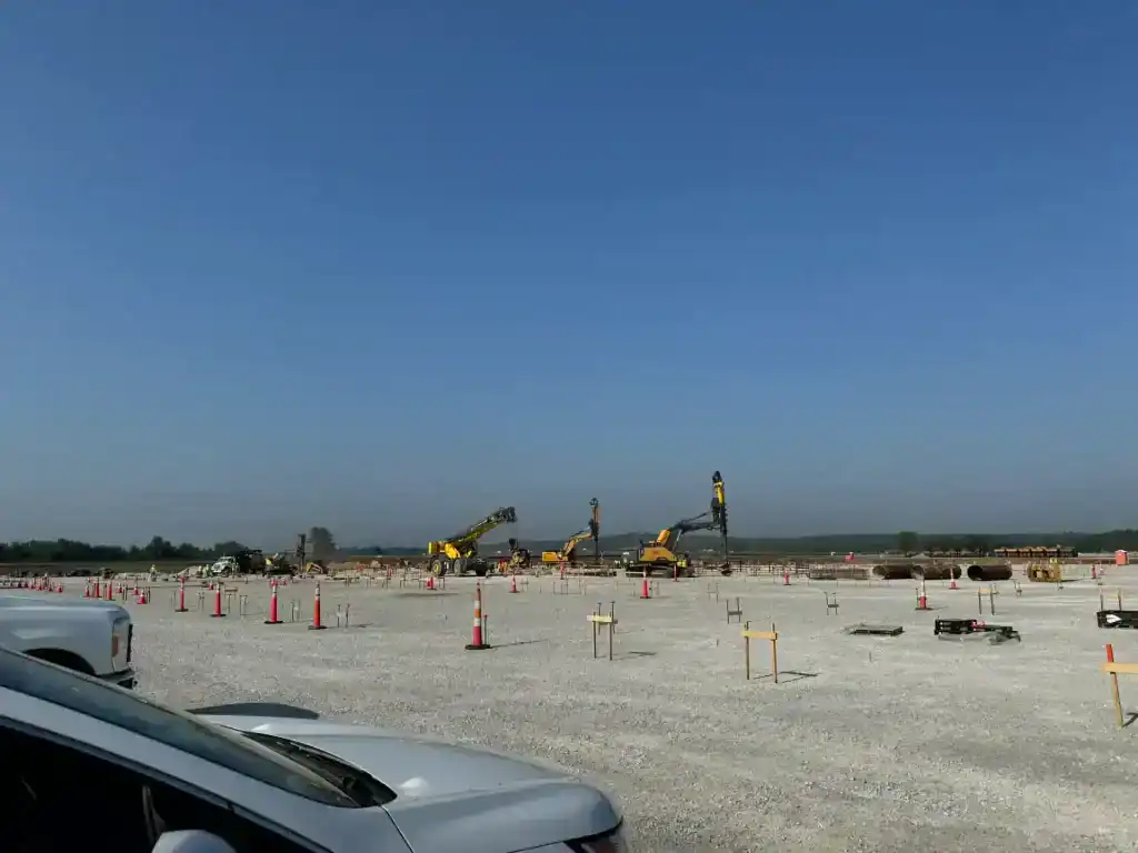Substation construction site in Northern Indiana with cranes and equipment.