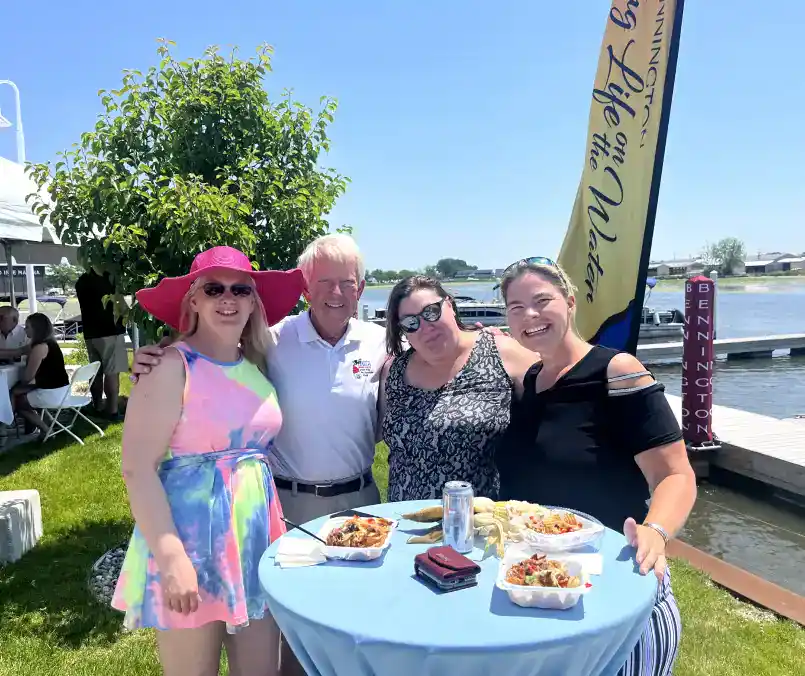Bright outdoor dining at Hall's Sport Center waterfront outdoor event.