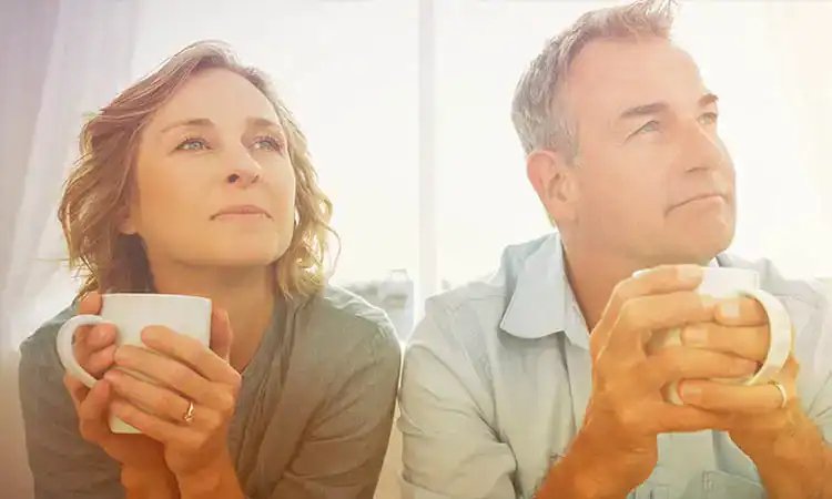 Comfortable, relaxing moment at Hall's Sport Center with two people enjoying coffee.