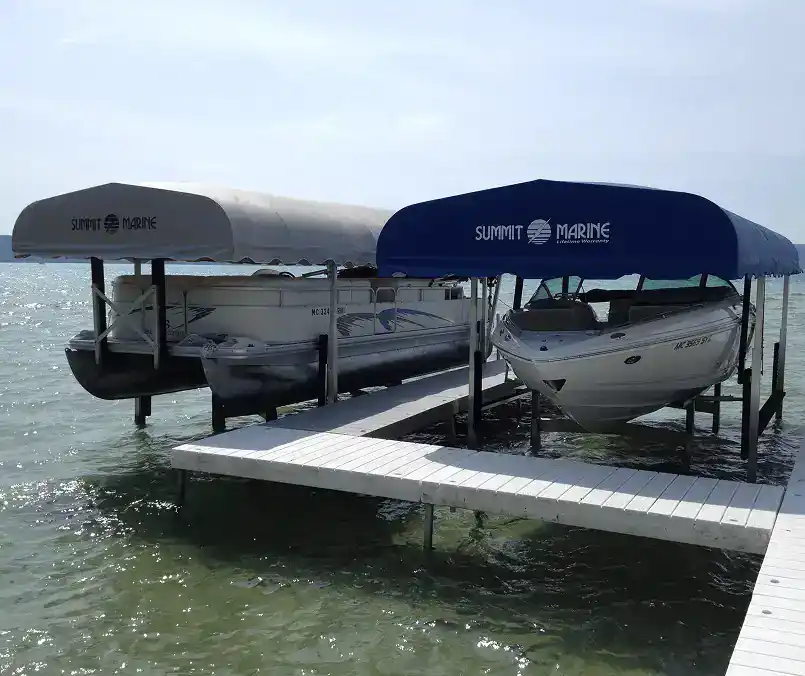 High-quality boats docked at Hall's Sport Center with boat cover shades, perfect for water sports and fishing.