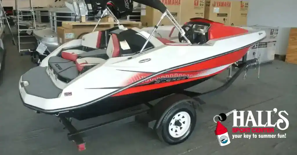 Speedboat on trailer at Hall's Sport Center for water sports and recreation. Perfect for boating ent.