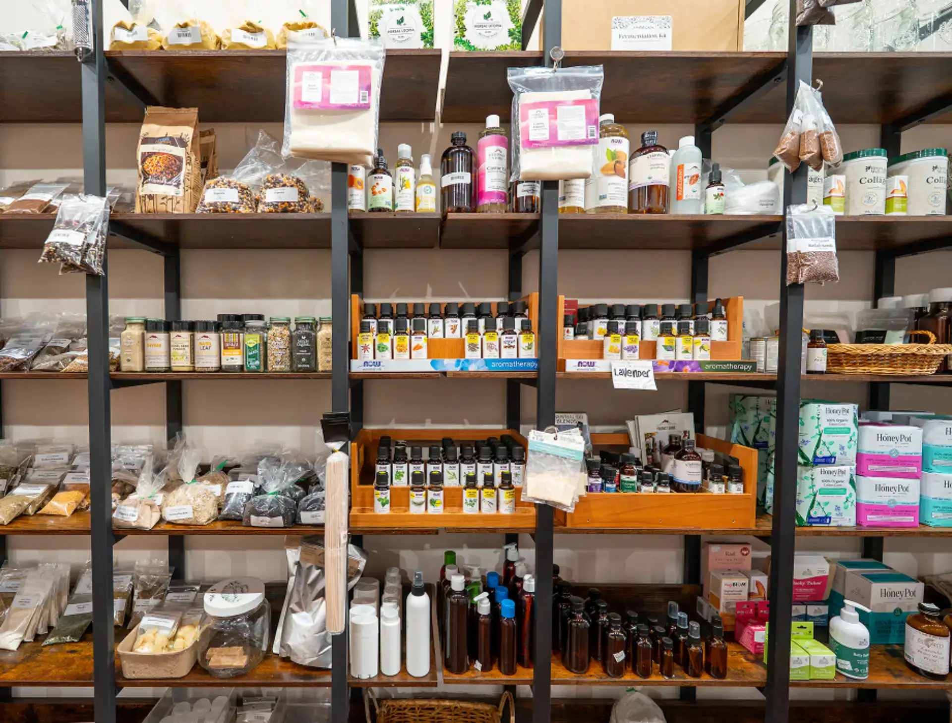 Display of natural health and wellness products on store shelves.