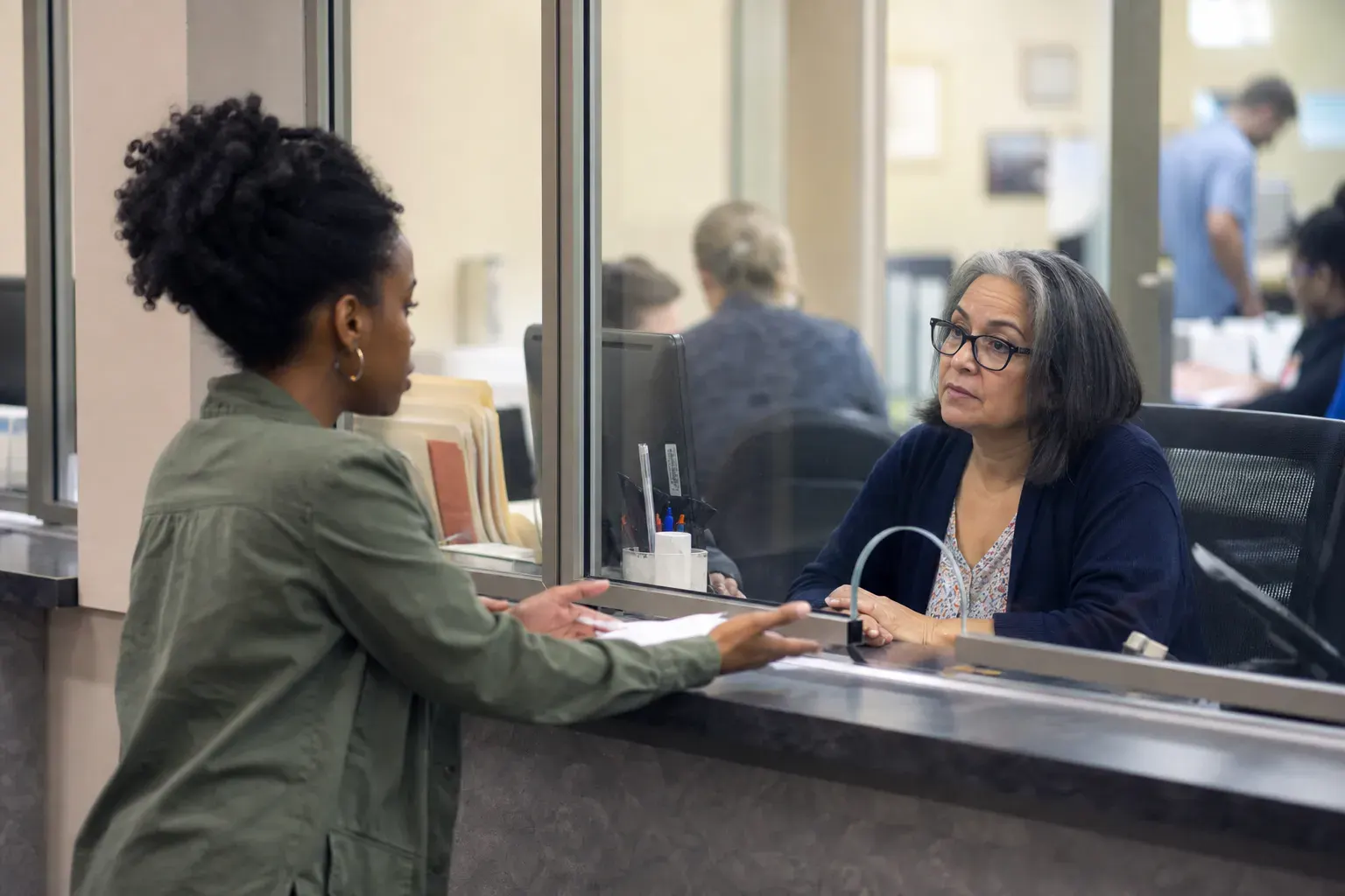 Tenant reviewing housing court summons and retaliation protection statutes