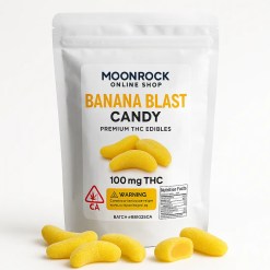 Banana Blast Candy – Premium THC Edibles by Moonrock Online Shop in resealable child-resistant pouch, labeled 100mg THC, California cannabis warning symbol, Prop 65 warning, batch #BB1025CA, nutrition facts, and sugar-dusted banana-shaped THC candies on white background