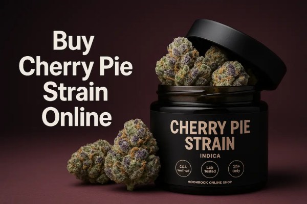Hero image of Cherry Pie strain cannabis buds in a black jar with frosty purple-green nugs on a dark cherry background promoting Buy Cherry Pie Strain Online from Moonrock Online Shop.