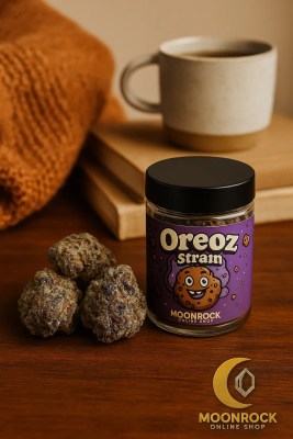 Buy Oreoz strain cannabis flower online from Moonrock Online Shop shown in cozy lifestyle setting on wooden table with rolling tray and candle