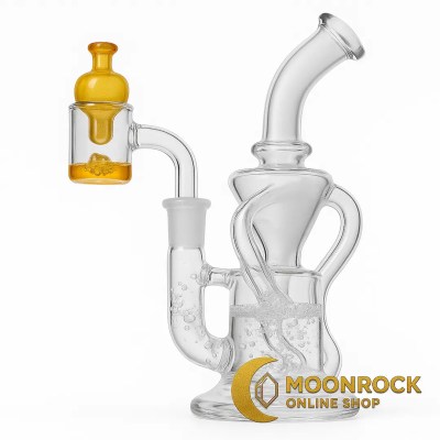 Clear glass recycler dab rig showing water circulation and attached quartz banger