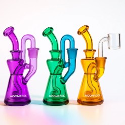 Four color options of a 5.5-inch mini recycler rig with 10 mm joint—purple, green, blue, and amber—on a clean studio backdrop from Moonrock Online Shop