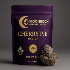 Premium Cherry Pie strain cannabis pouch in royal purple and gold with Moonrock Online Shop logo, CA cannabis warning badge, COA Verified seal, and frosty bud beside the package.